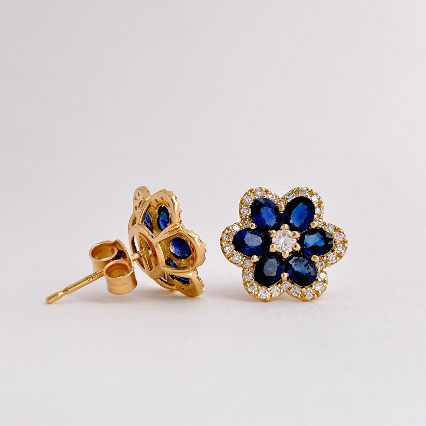 Aretes roseta zafiro con diamantes en Oro 18k