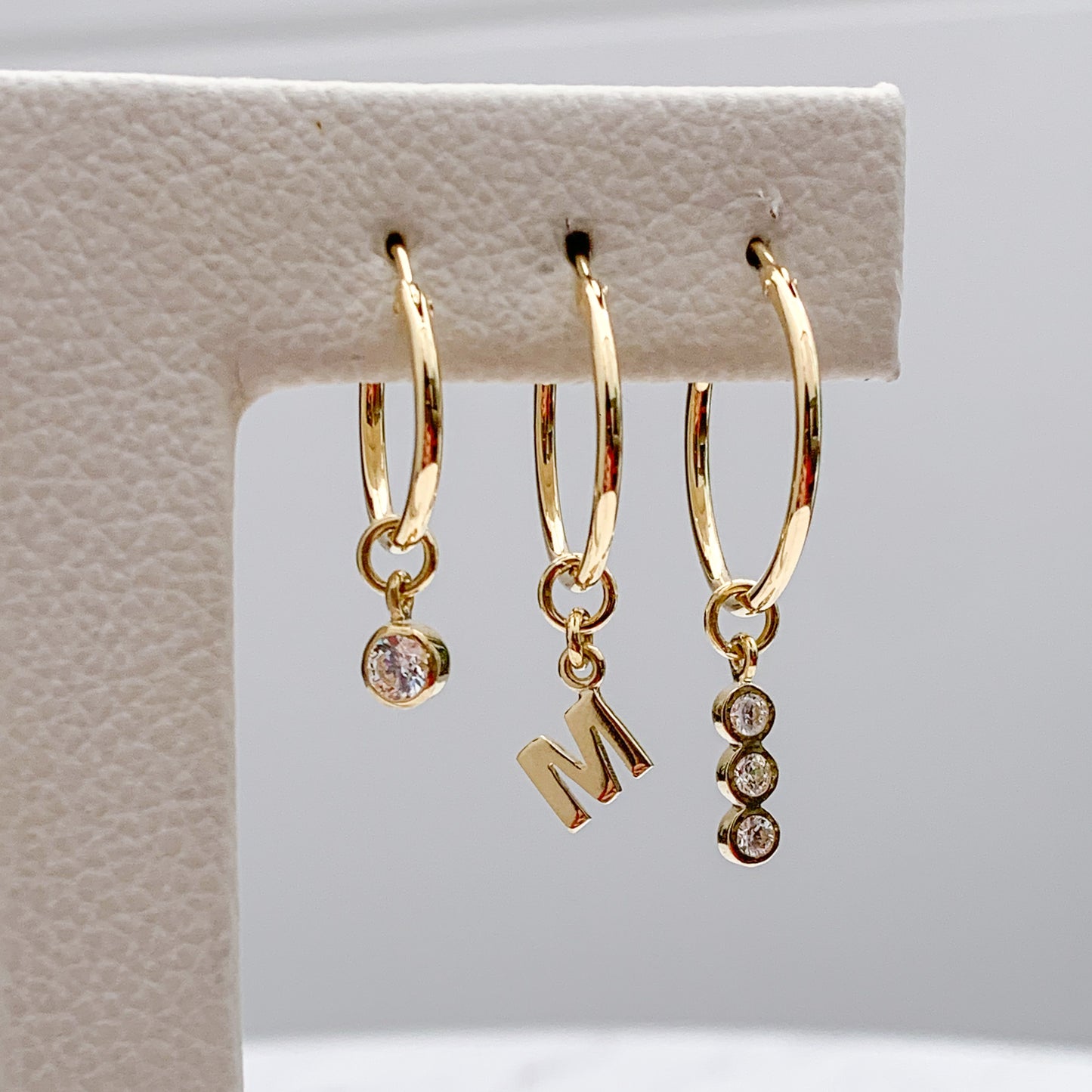 Charm de punto de luz para argolla en Oro 18k