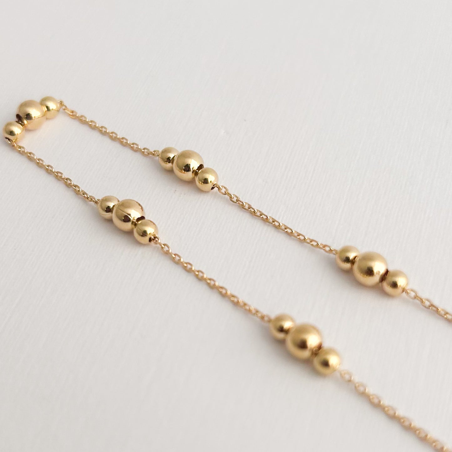 Gargantilla 3 bolitas Oro18k