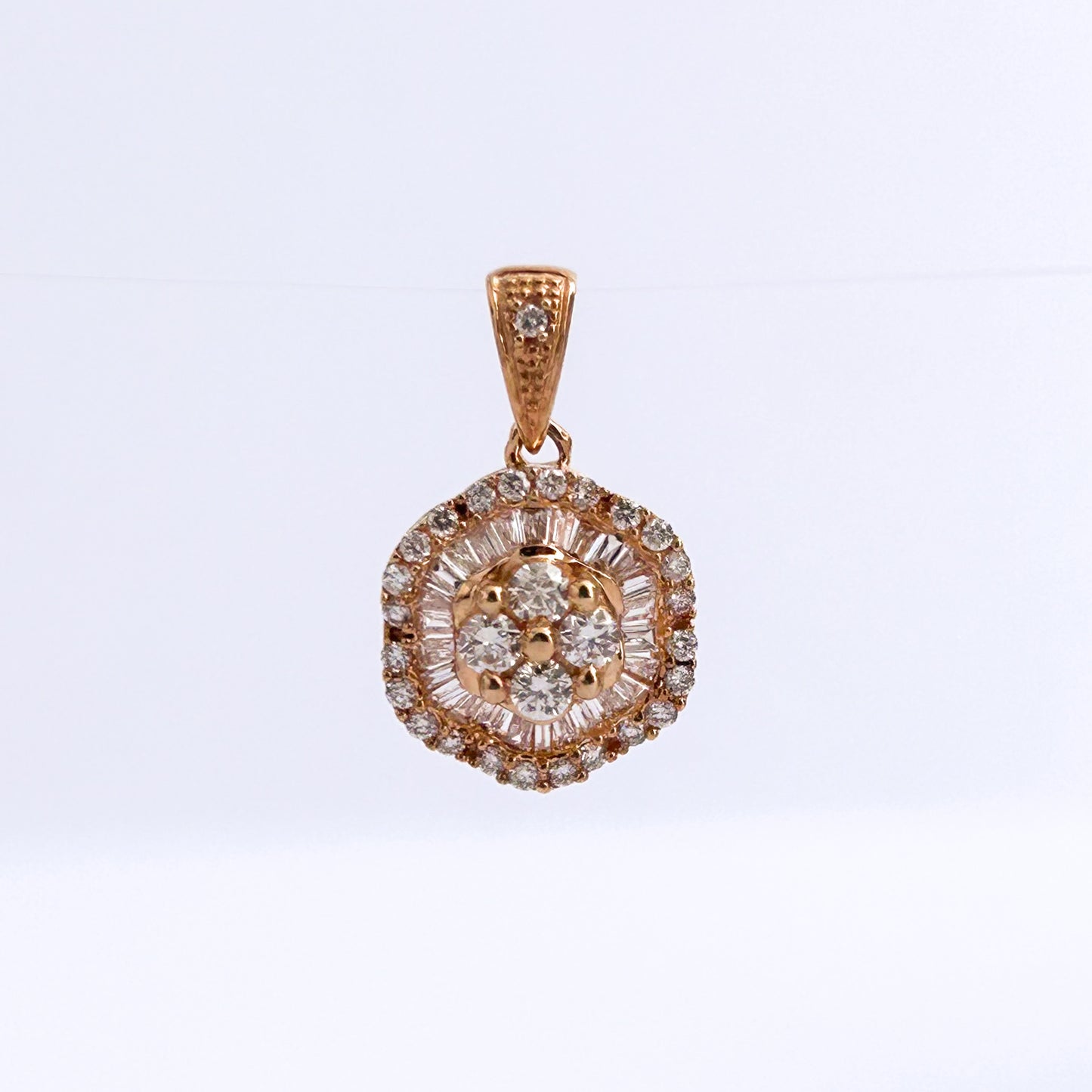 Dije Roseta wave con diamantes en oro 18k