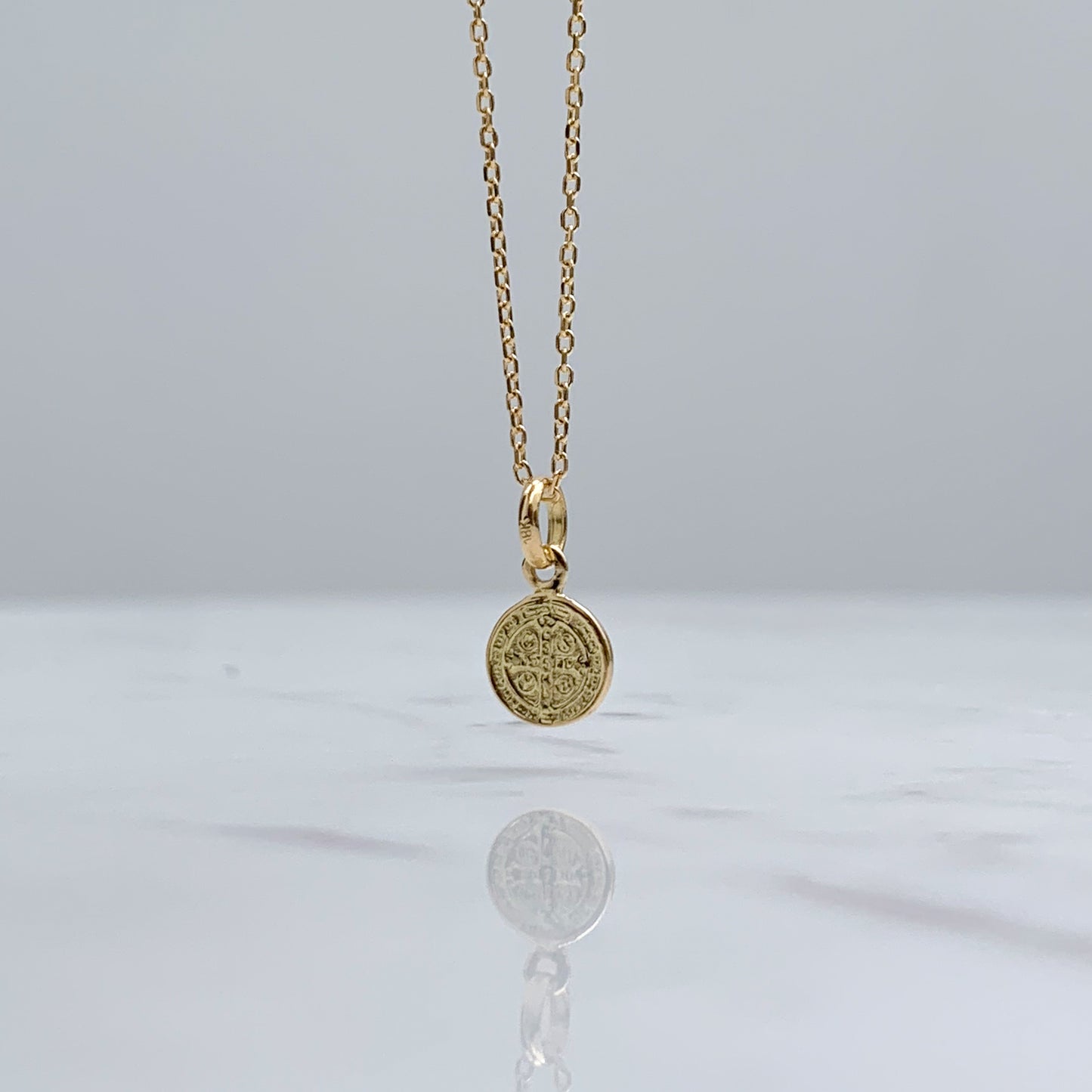 Dije San Benito Oro 18K