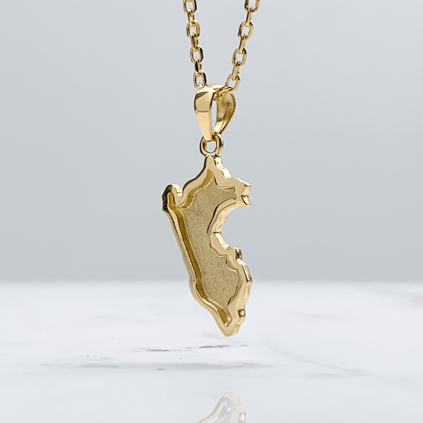 Dije Mapa de Perú en Oro18k