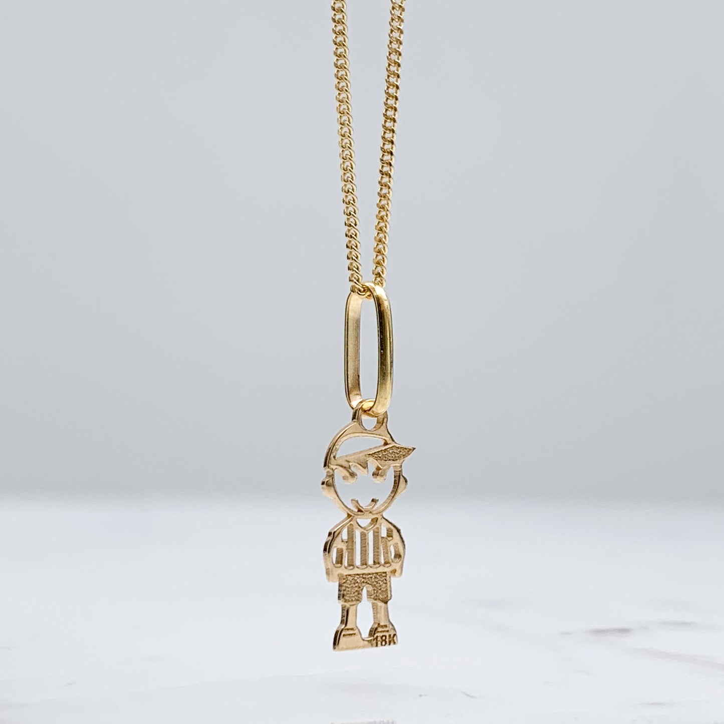 Dije de niño(a) pequeño calado oro 18k