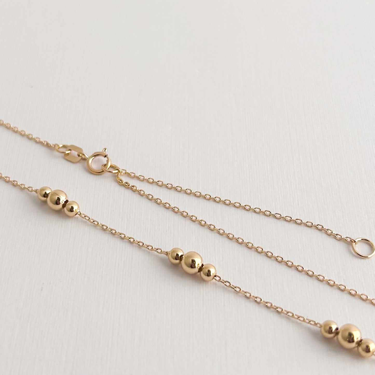 Gargantilla 3 bolitas Oro18k