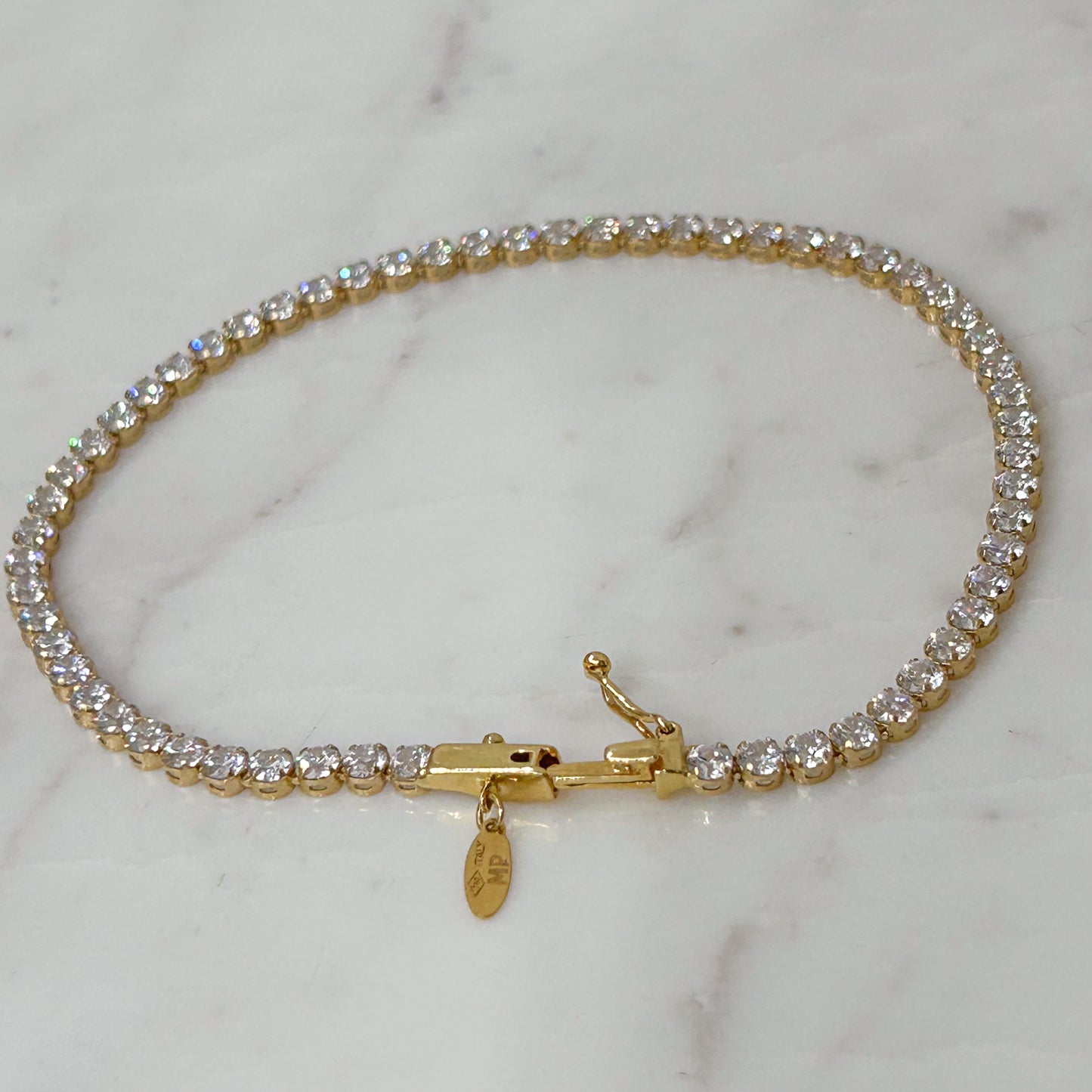 Pulsera tenis gruesa circones oro 18k
