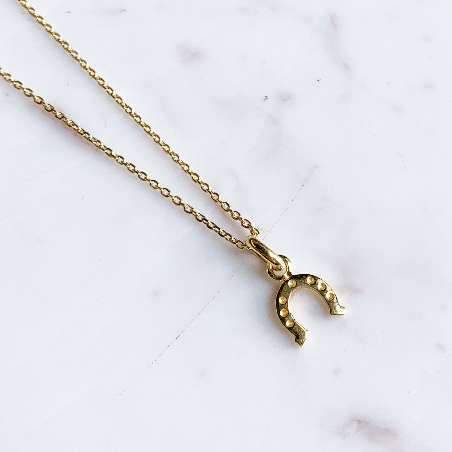 Dije de Herradura Oro18k