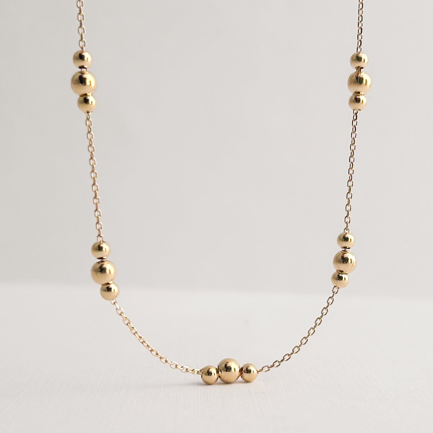 Gargantilla 3 bolitas Oro18k