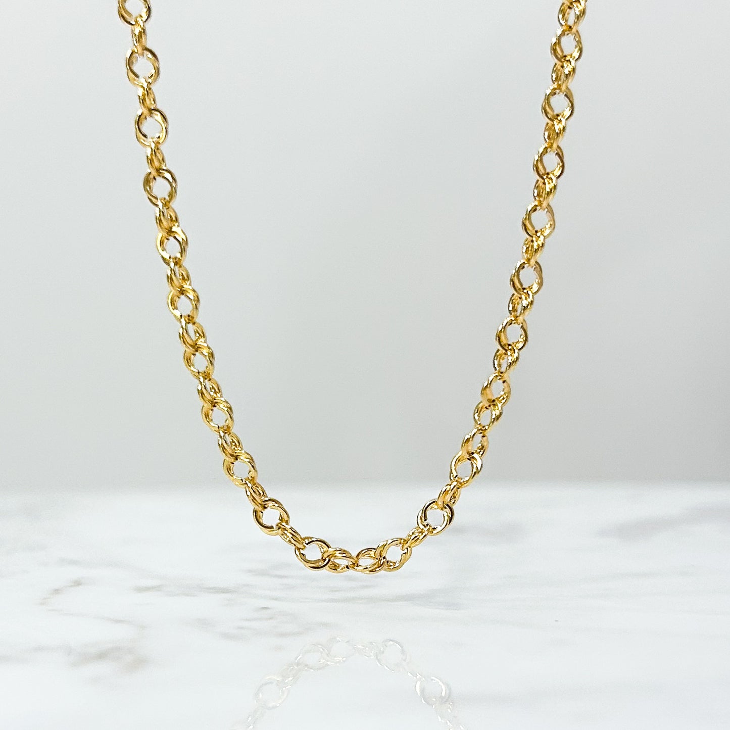 Cadena rolo entorchada - Oro18k