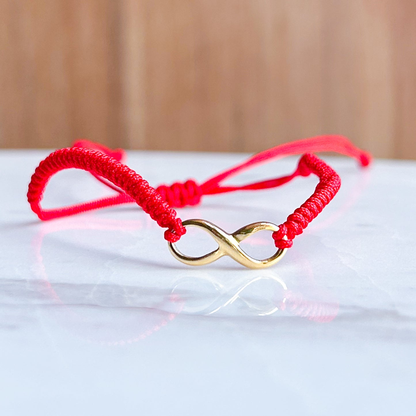 Pulsera hilo infinito oro 18k