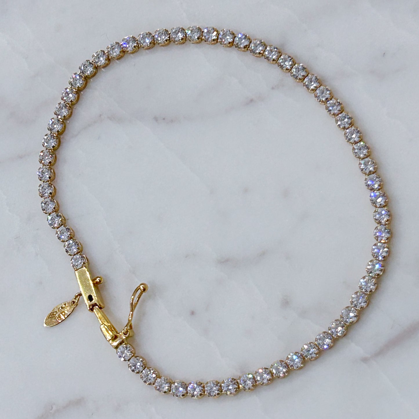 Pulsera tenis gruesa circones oro 18k