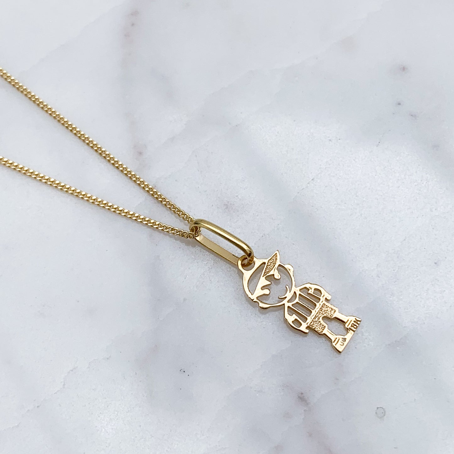 Dije de niño(a) pequeño calado oro 18k
