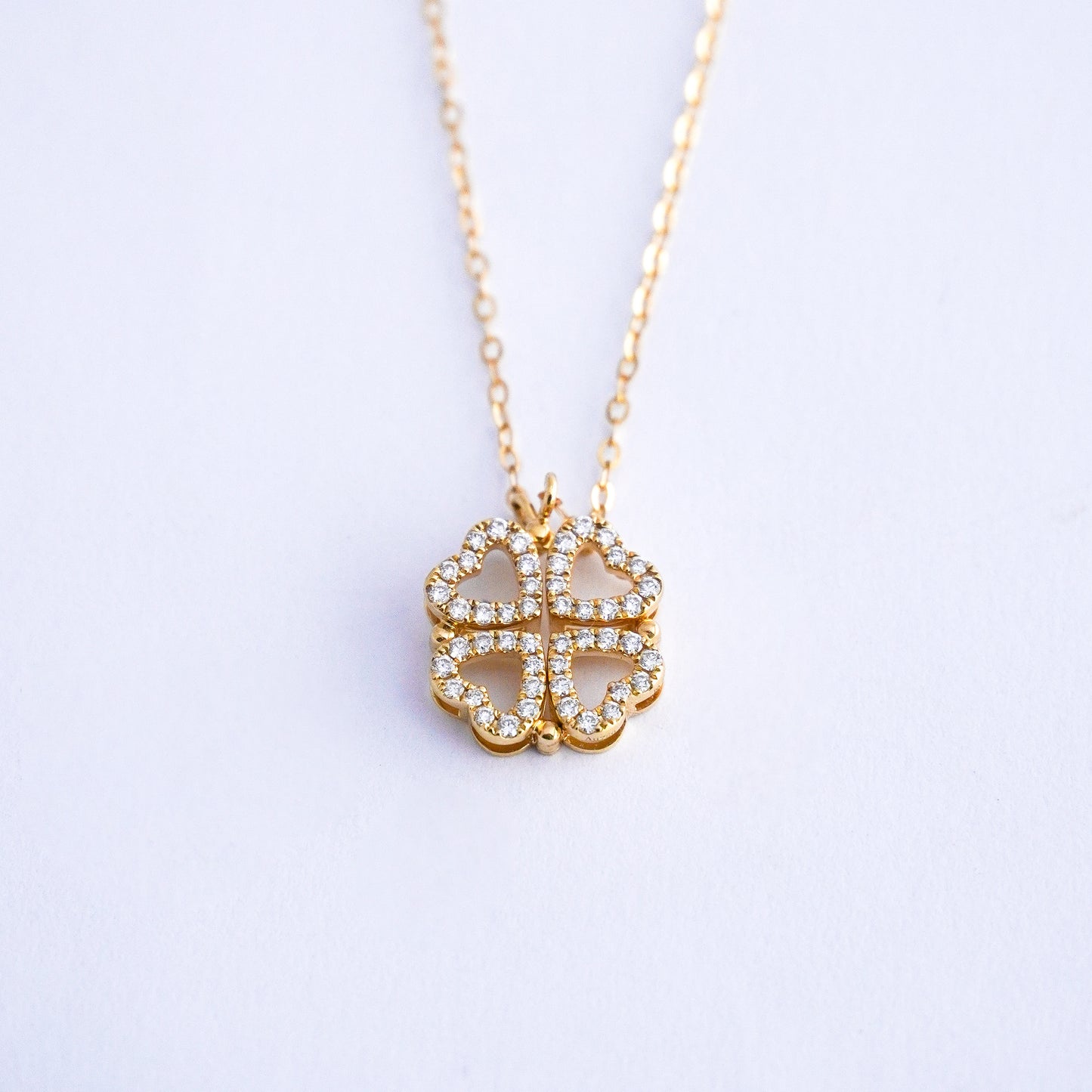 Collar corazones trebol con diamantes naturales en Oro18k