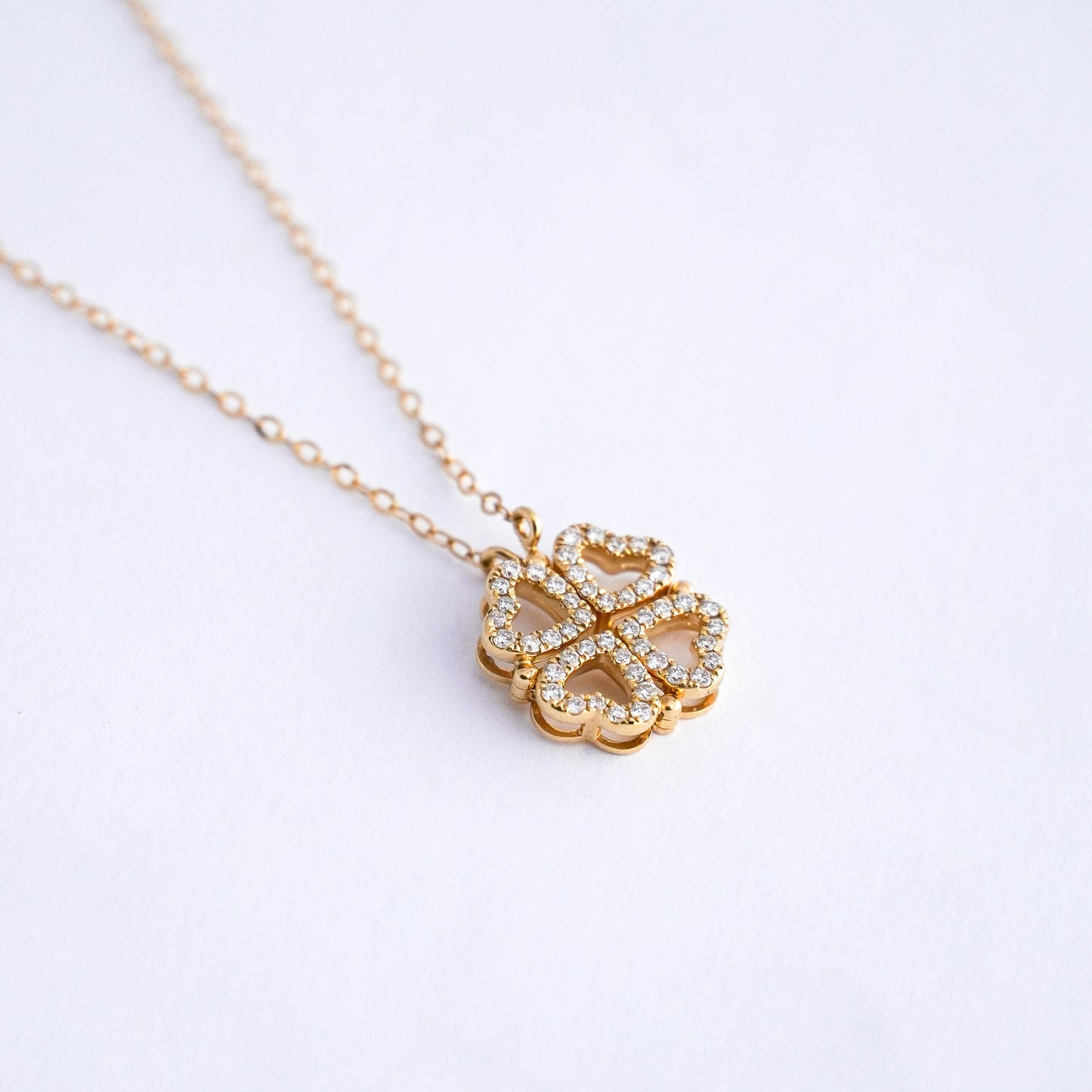 Collar corazones trebol con diamantes naturales en Oro18k