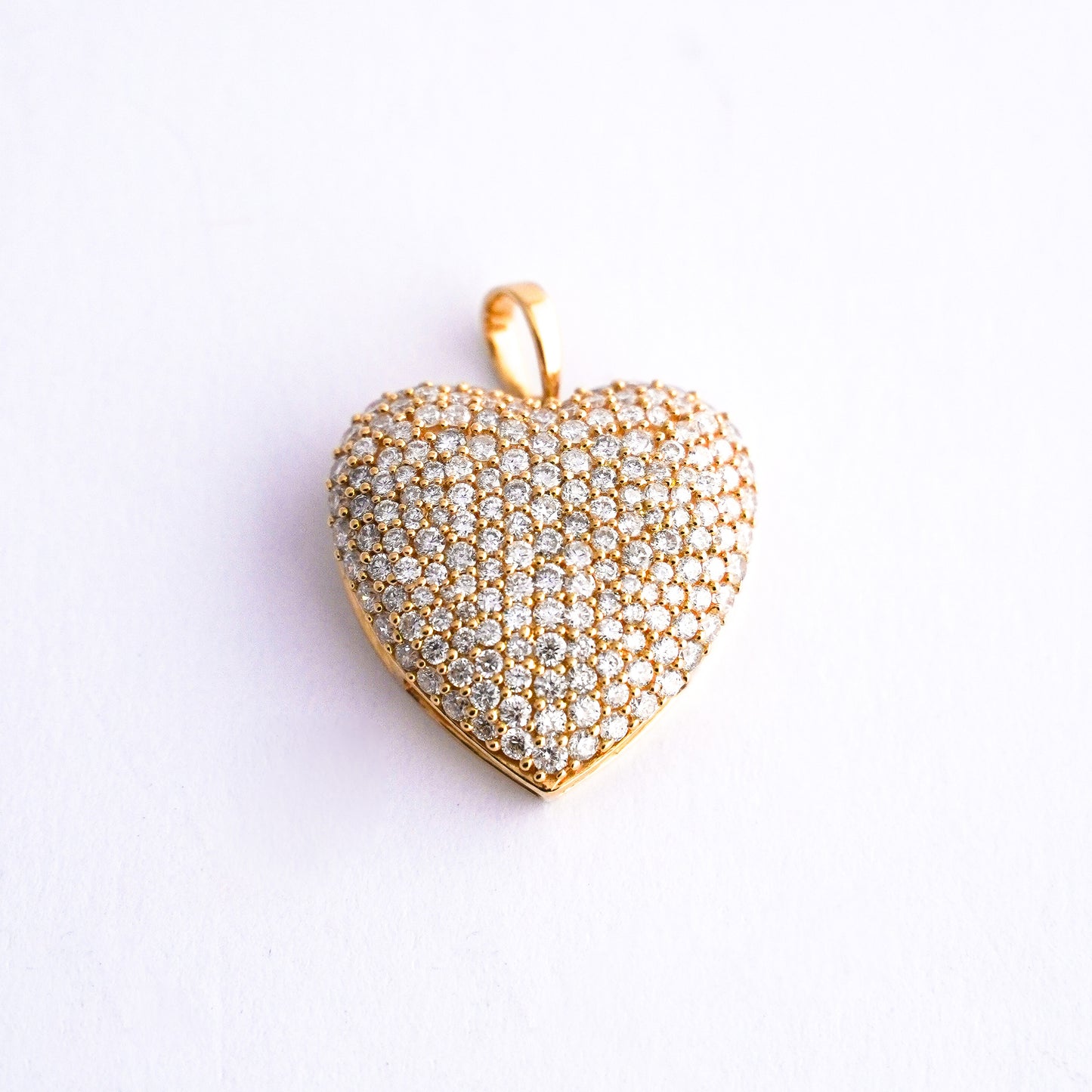 Dije corazon pave con diamantes naturales Oro18k