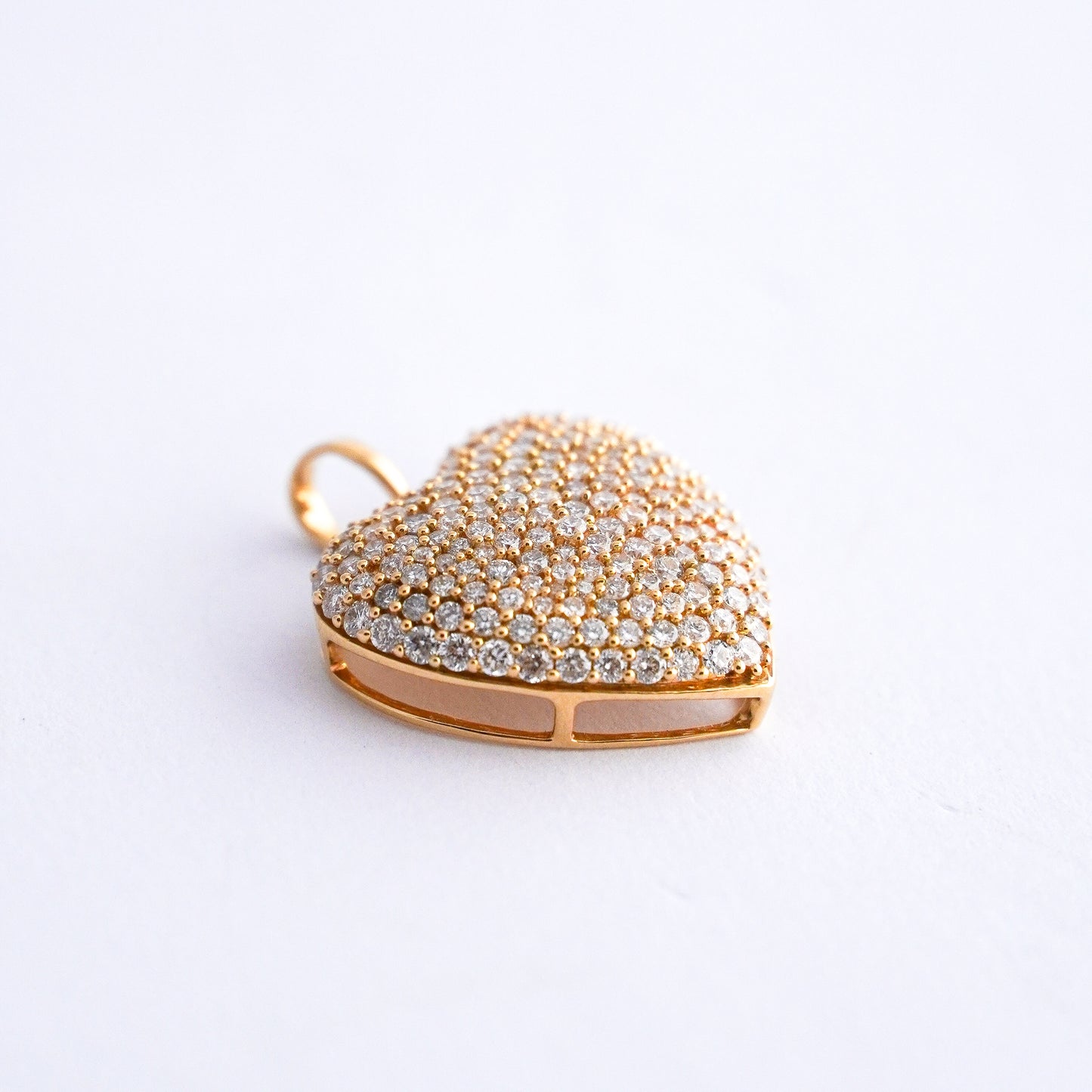Dije corazon pave con diamantes naturales Oro18k