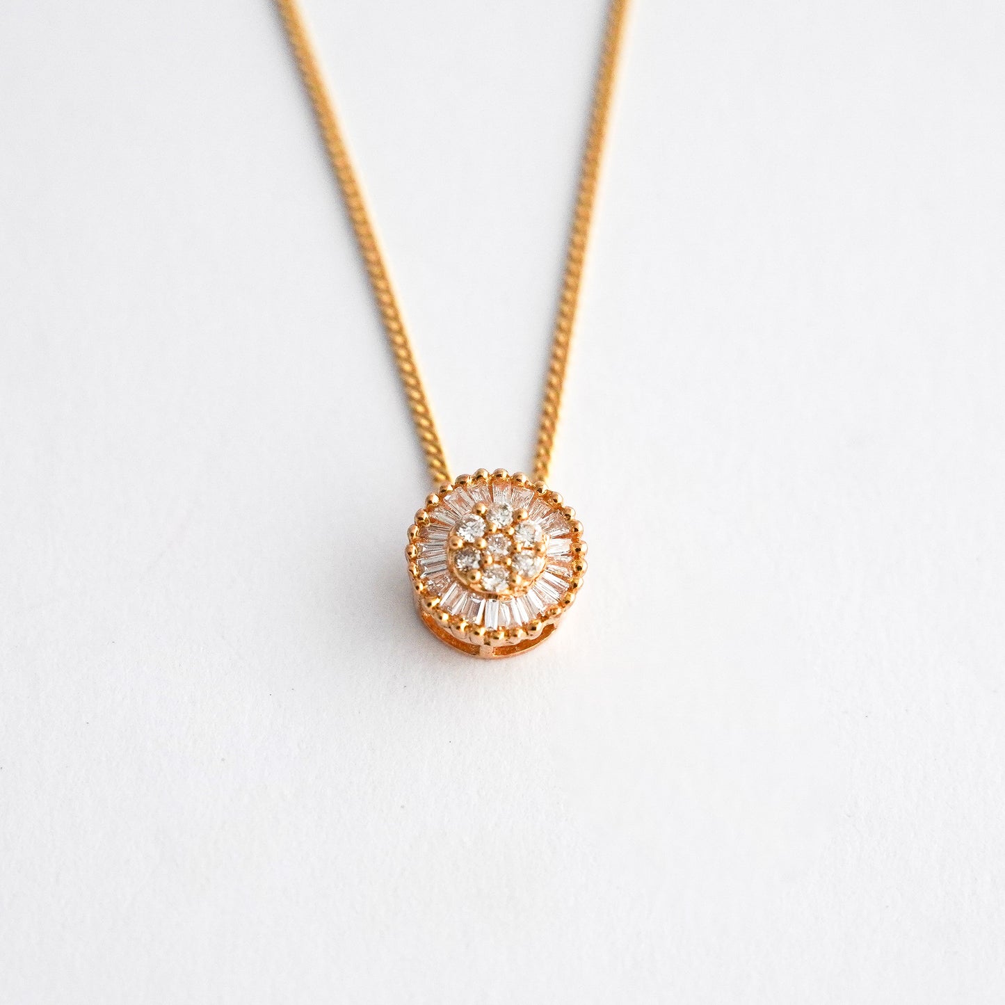 Dije pasante punto de luz con diamantes en oro18k
