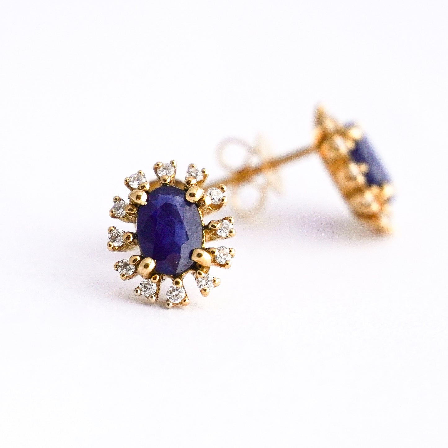 Aretes corona azul con zafiro y diamantes naturales en Oro18k