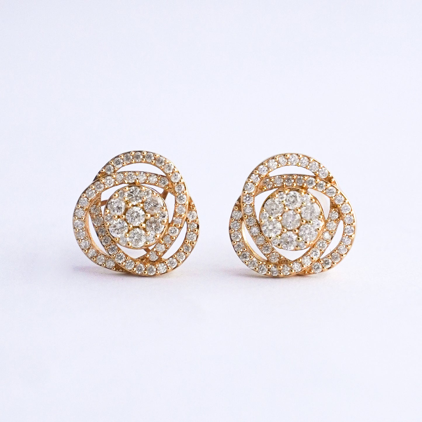 Aretes triara con diamantes naturales Oro18k
