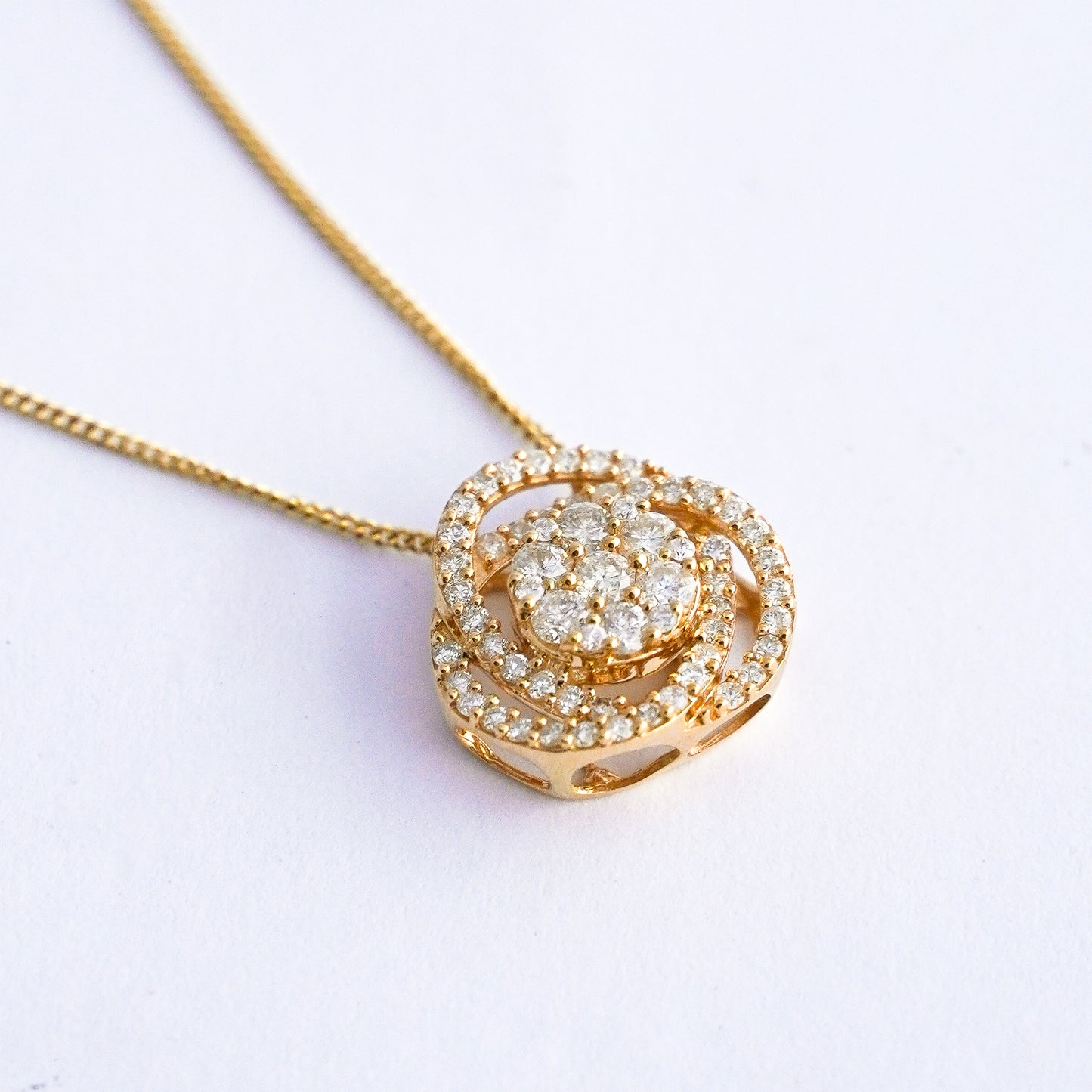 Dije Triara diamantes naturales Oro18k