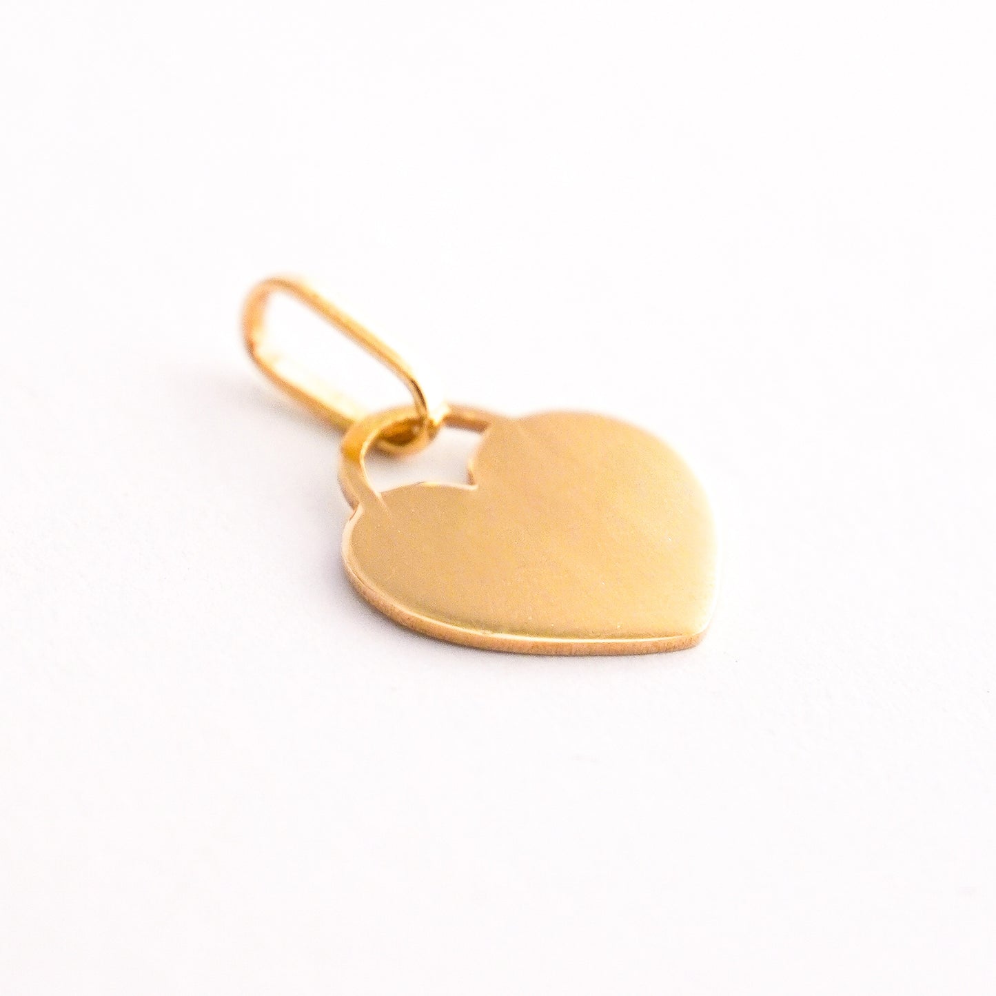 Dije placa corazón Oro18k