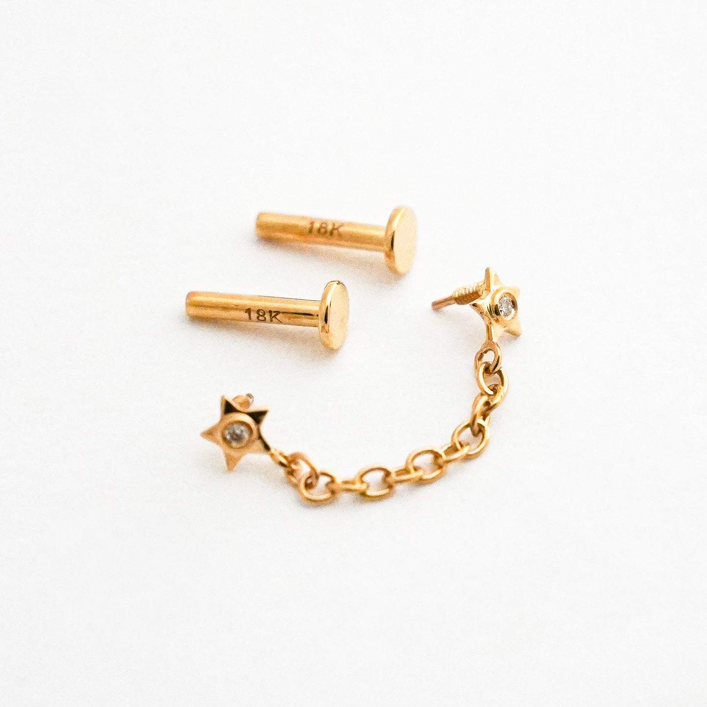 Piercing Twin Star con Cadena en Oro 18K