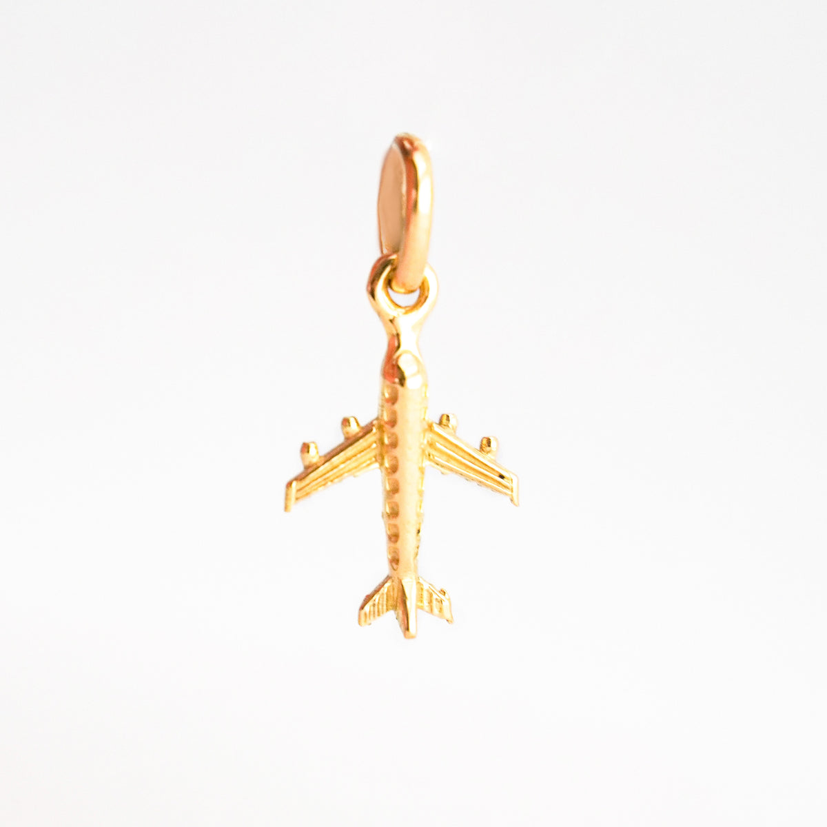 Dije Avión Pequeño en Oro 18K