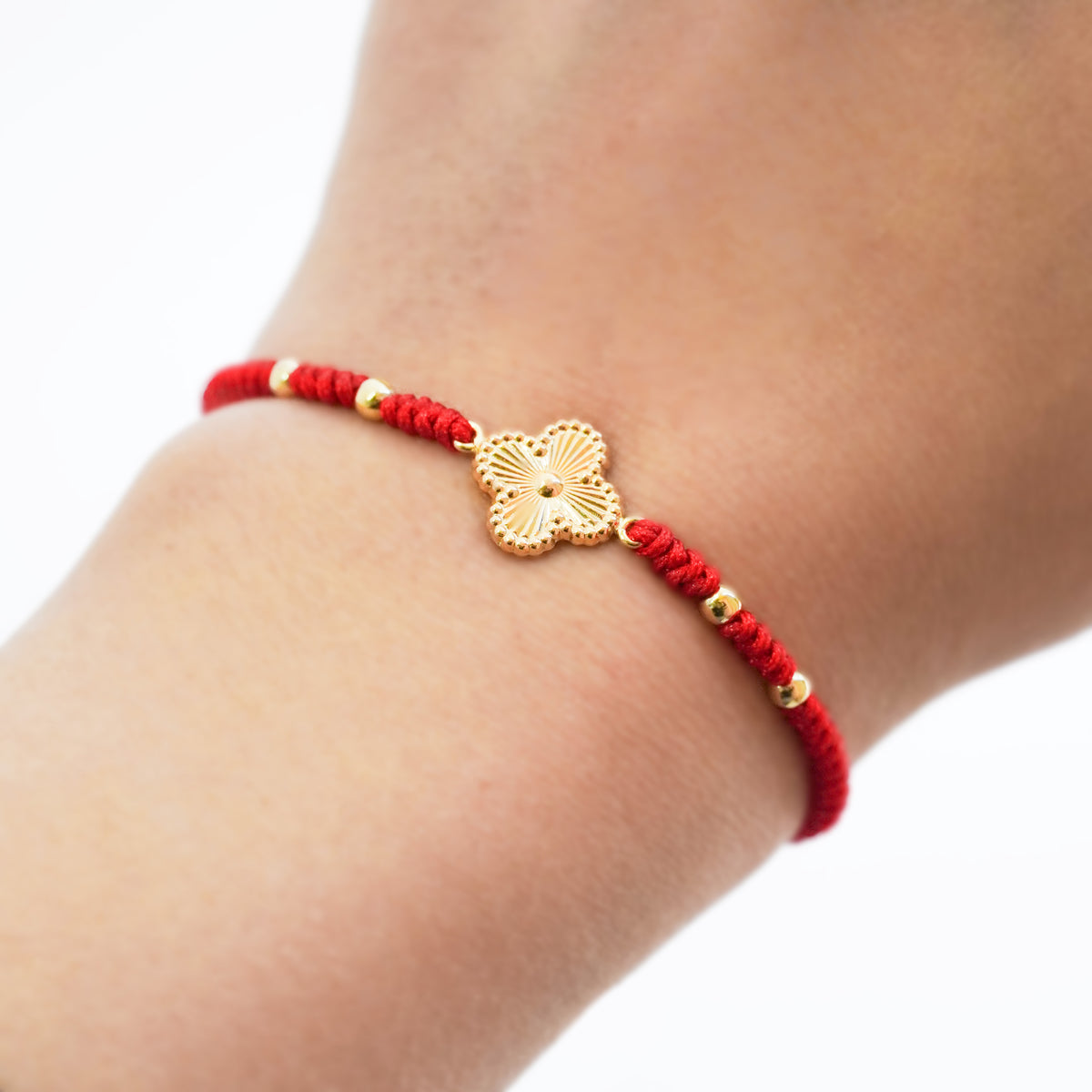 Pulsera Tejida Trébol Solitario con Bolitas en Oro 18K