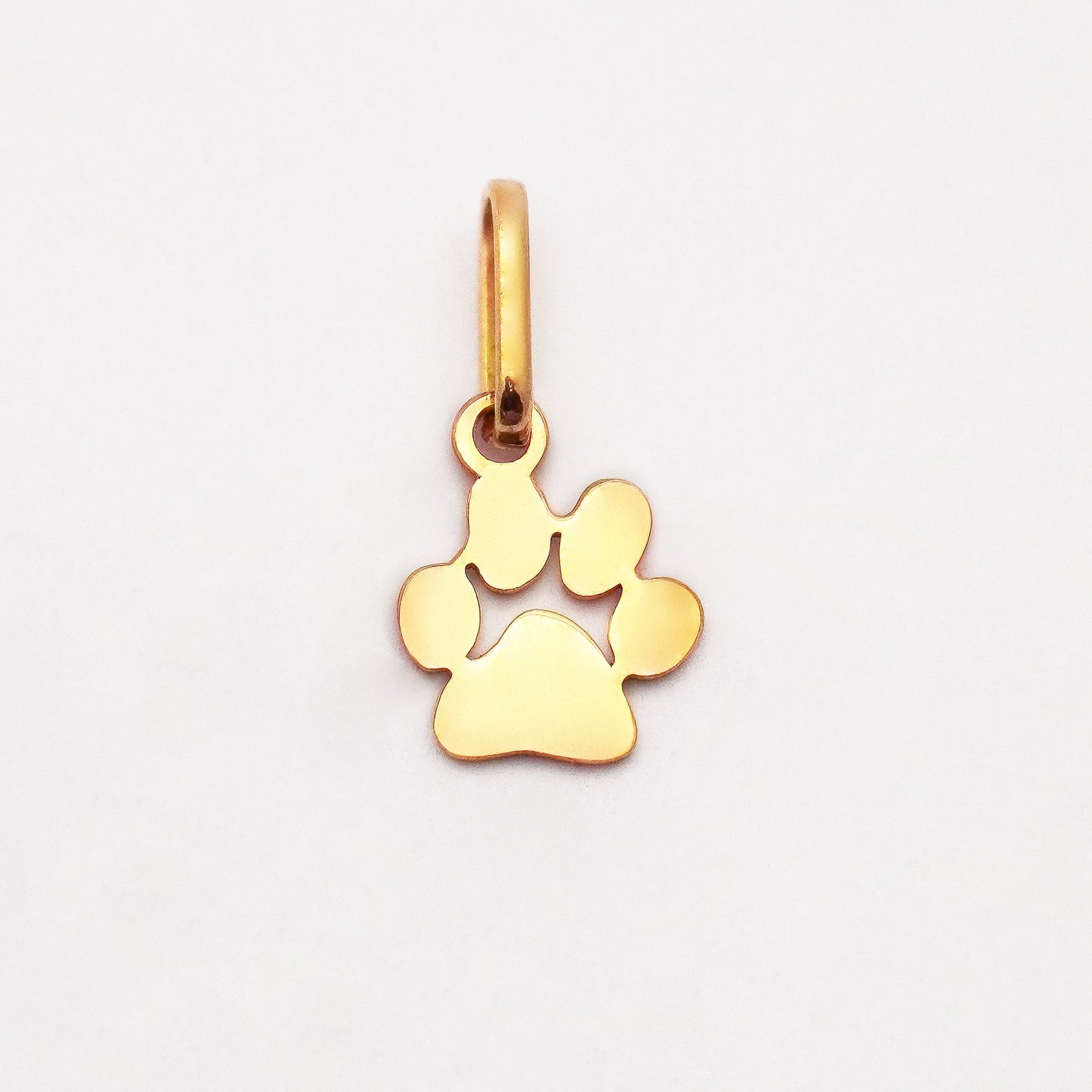 Dije Huellita mini Oro18k