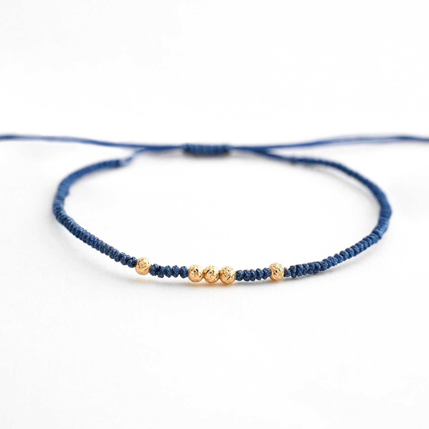 Pulsera blue line con bolitas diamantadas 2.5 mm en Oro18k
