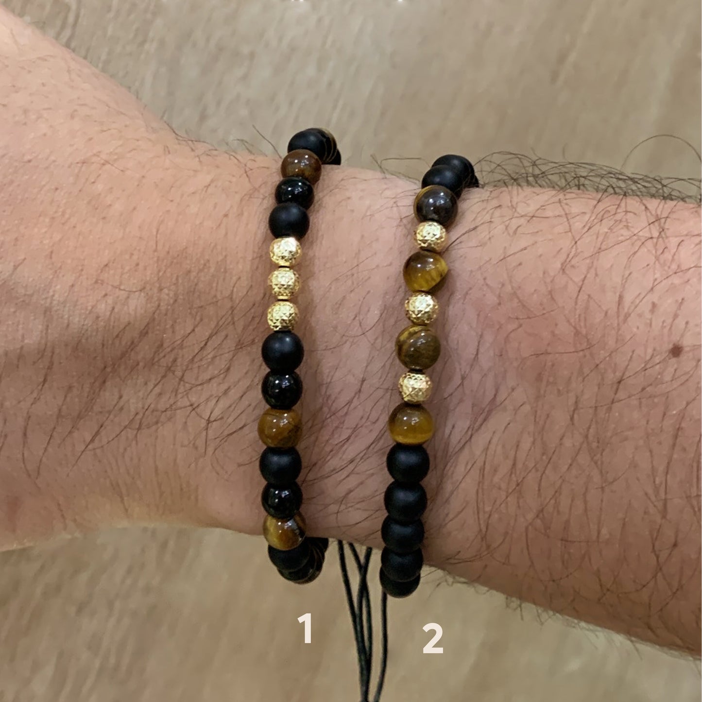 Pulsera tejida ónix y ojo de tigre con bolitas diamantadas 5mm en Oro18k