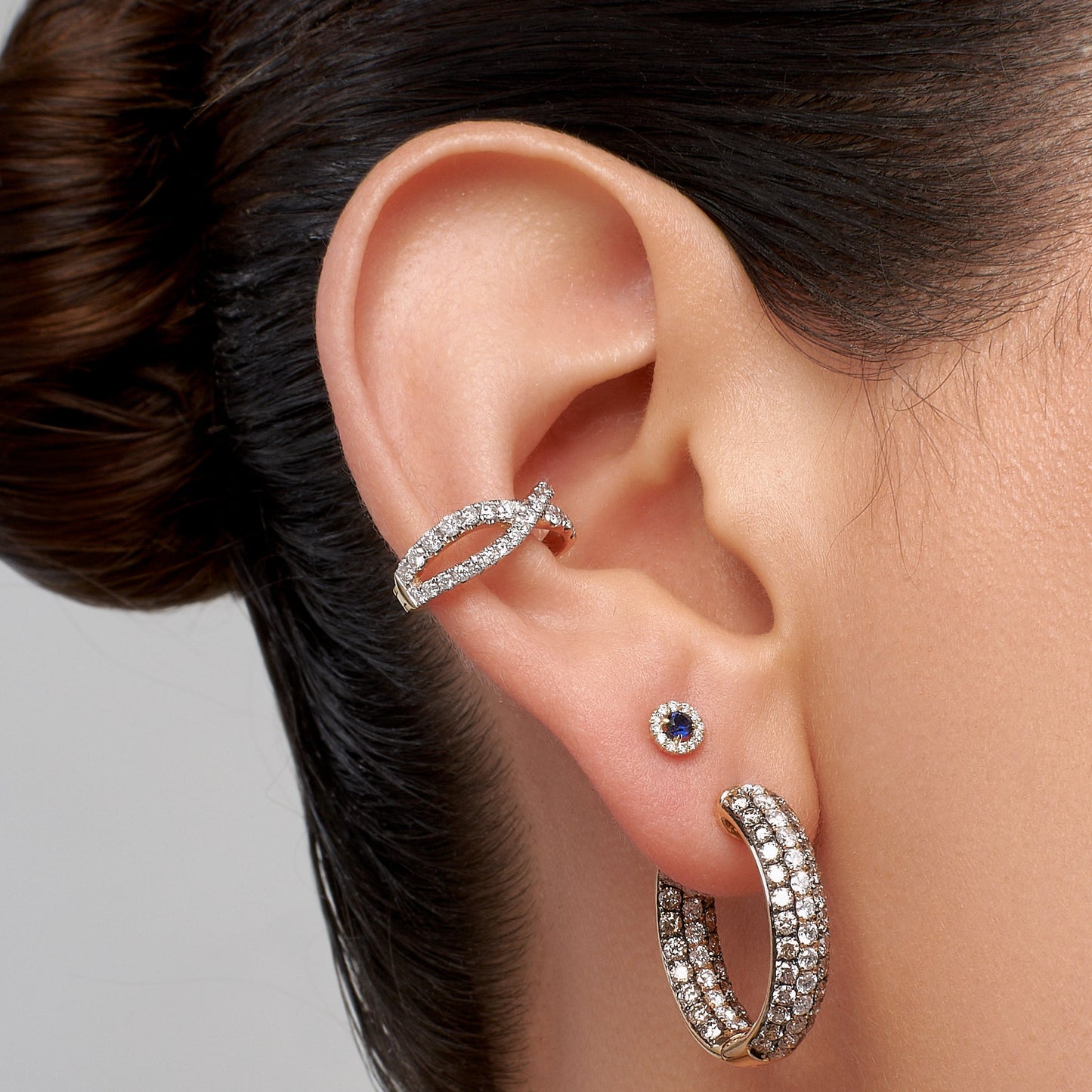 Ear cuff X con diamantes en Oro18k
