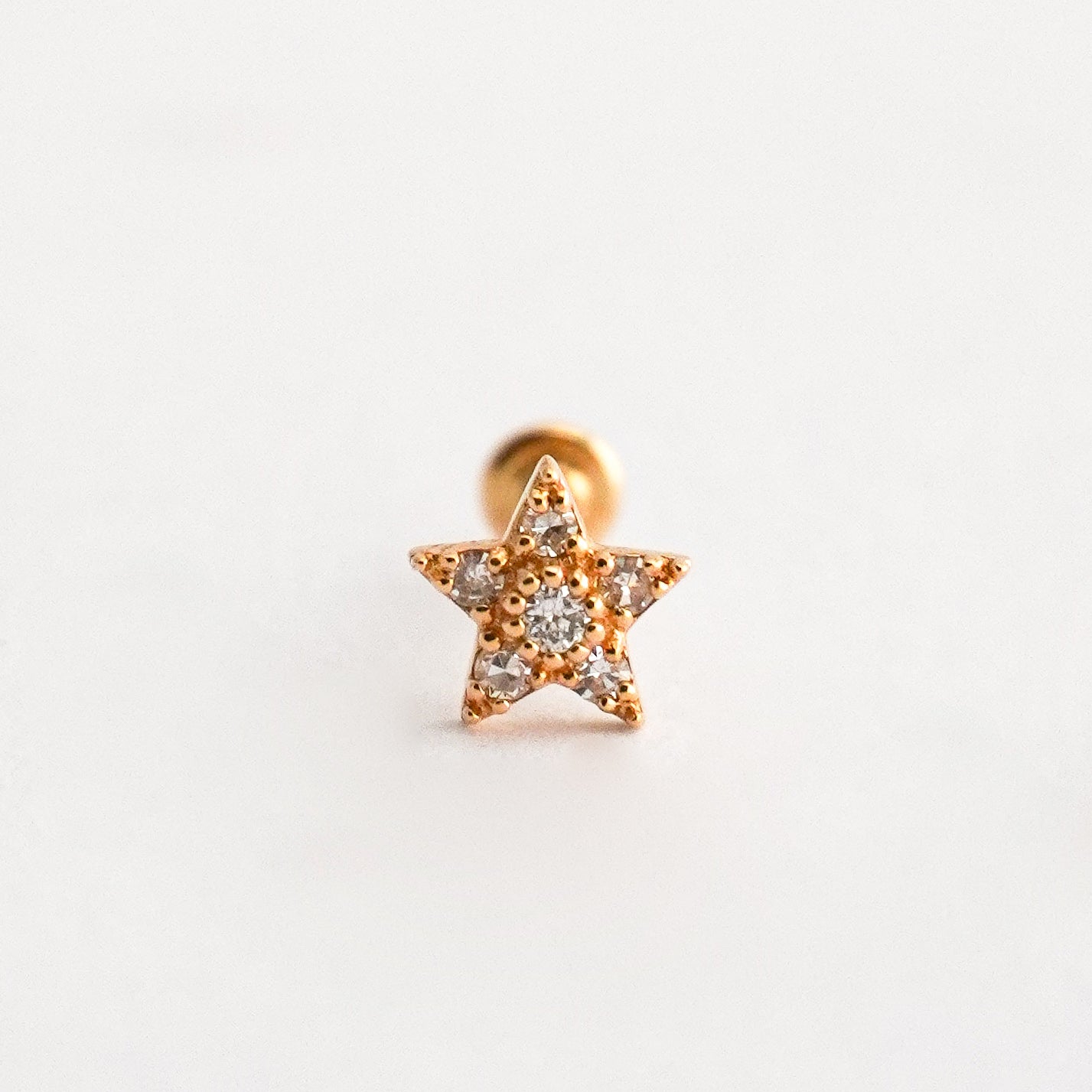 Piercing estrella en Oro18k con diamantes naturales