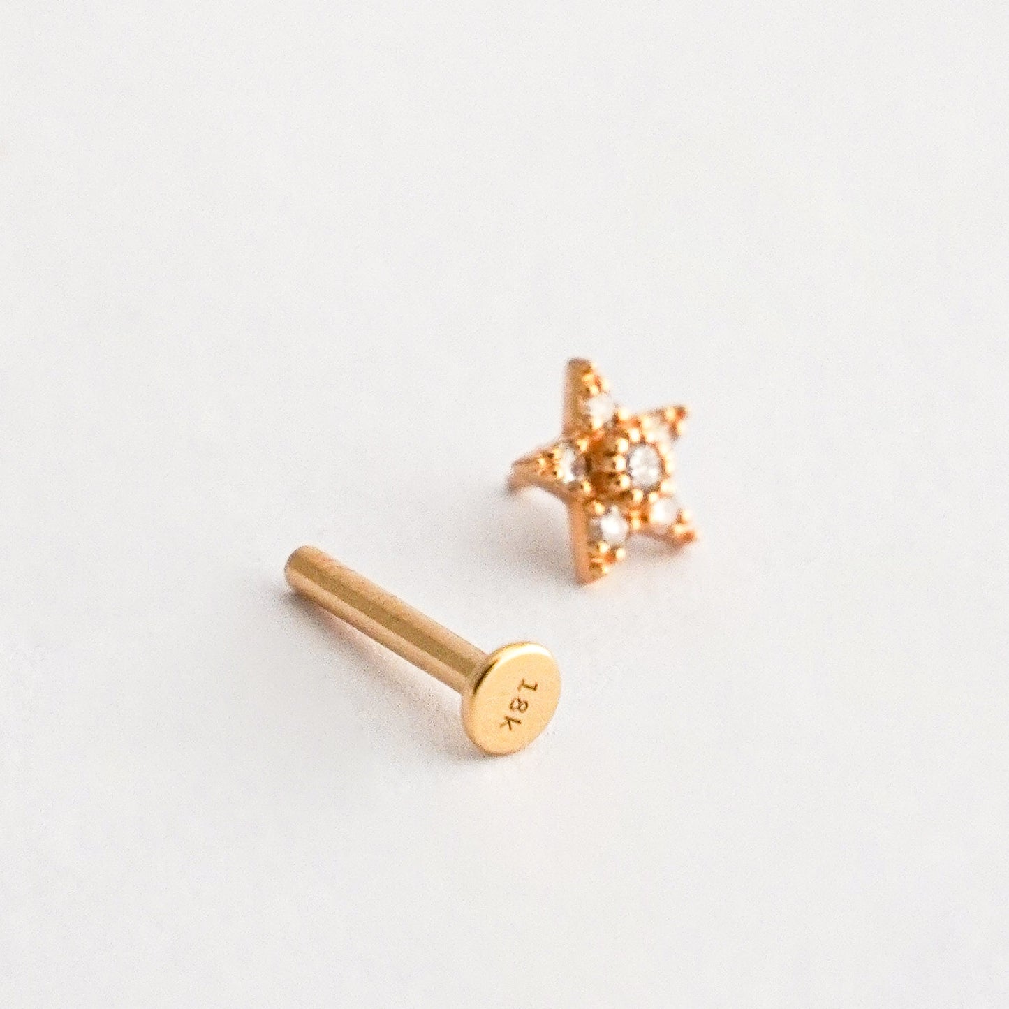 Piercing estrella en Oro18k con diamantes naturales