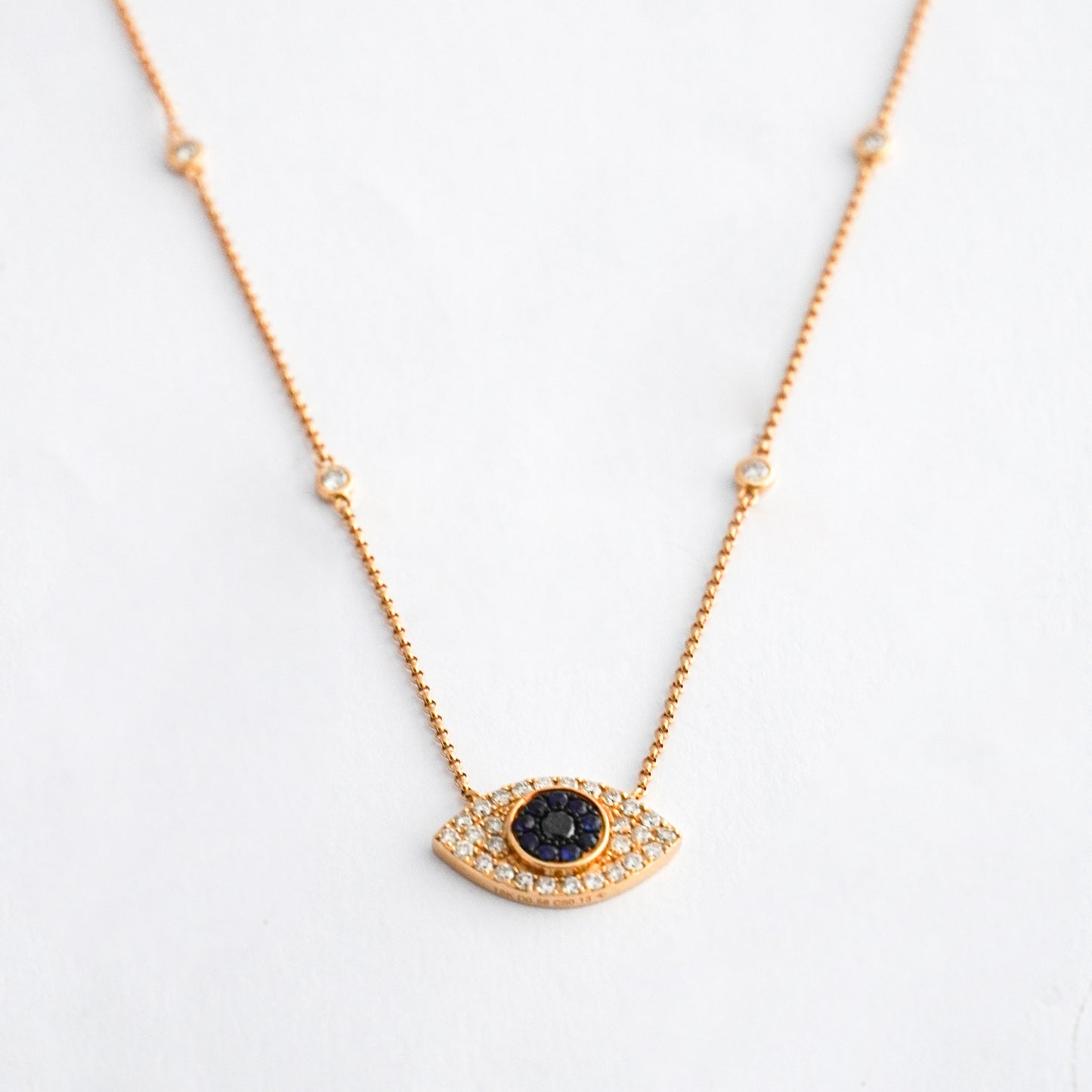 Collar ojo turco con zafiros y diamantes naturales Oro18k