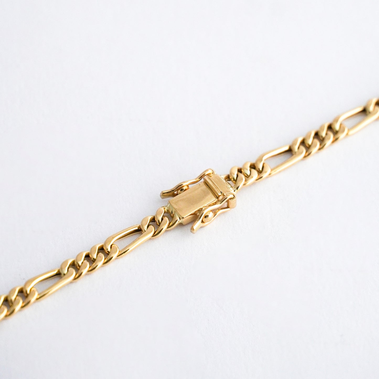 Cadena modelo figaro cartier Oro18k