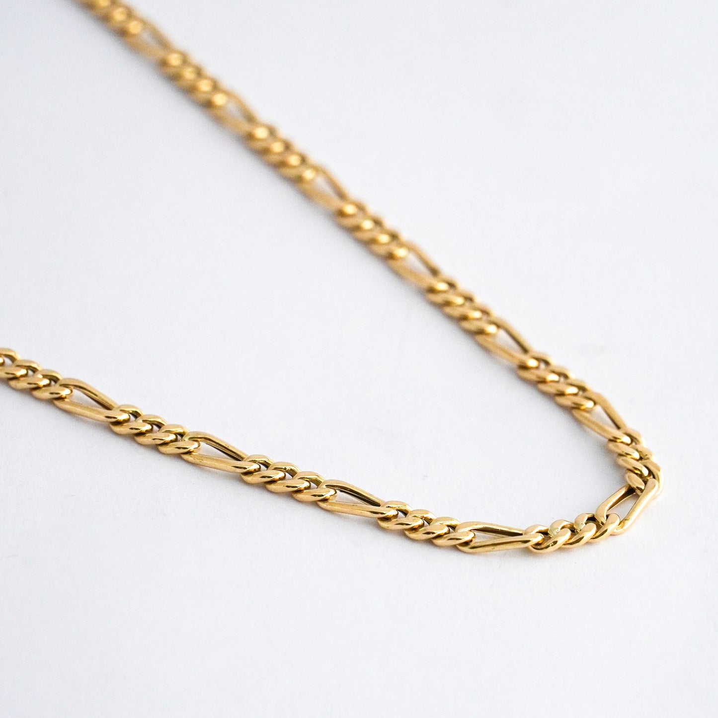 Cadena modelo figaro cartier Oro18k