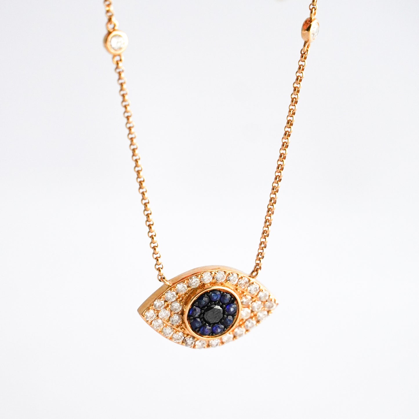 Collar ojo turco con zafiros y diamantes naturales Oro18k
