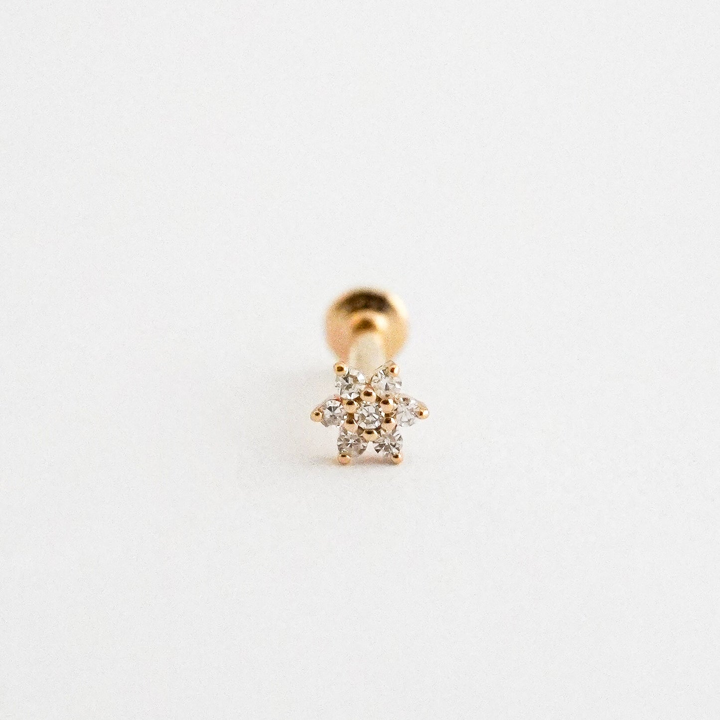 Piercing mini roseta en Oro18k con diamantes naturales