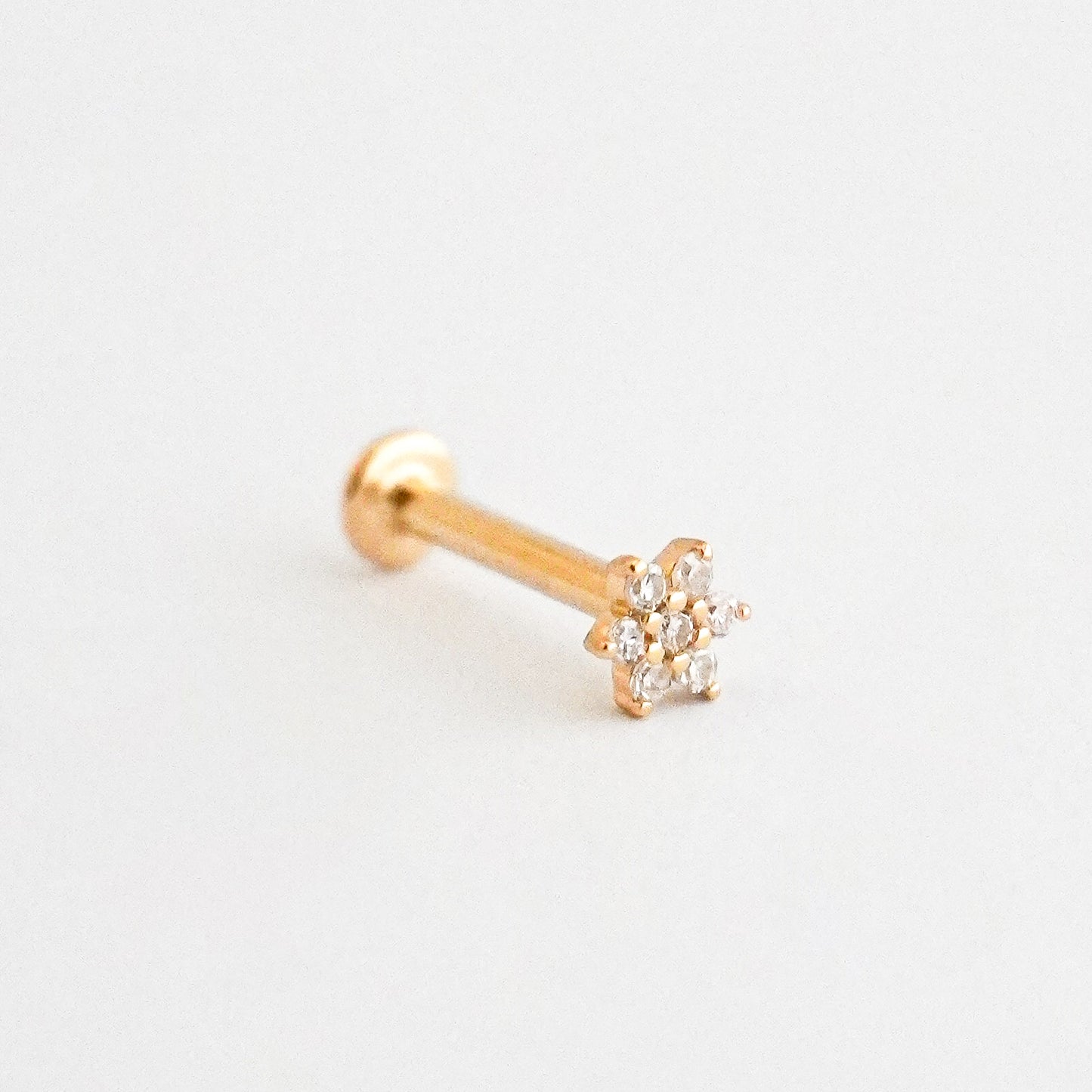 Piercing mini roseta en Oro18k con diamantes naturales