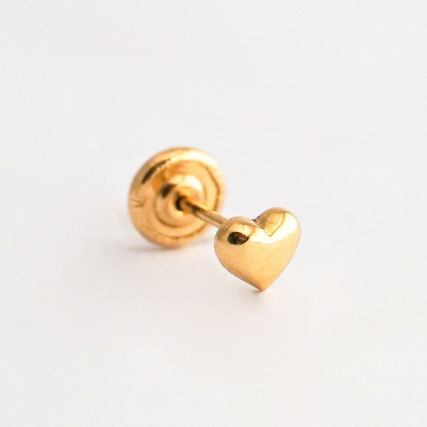 1/2 par arete bebé corazón 4.5 mm Oro 18k