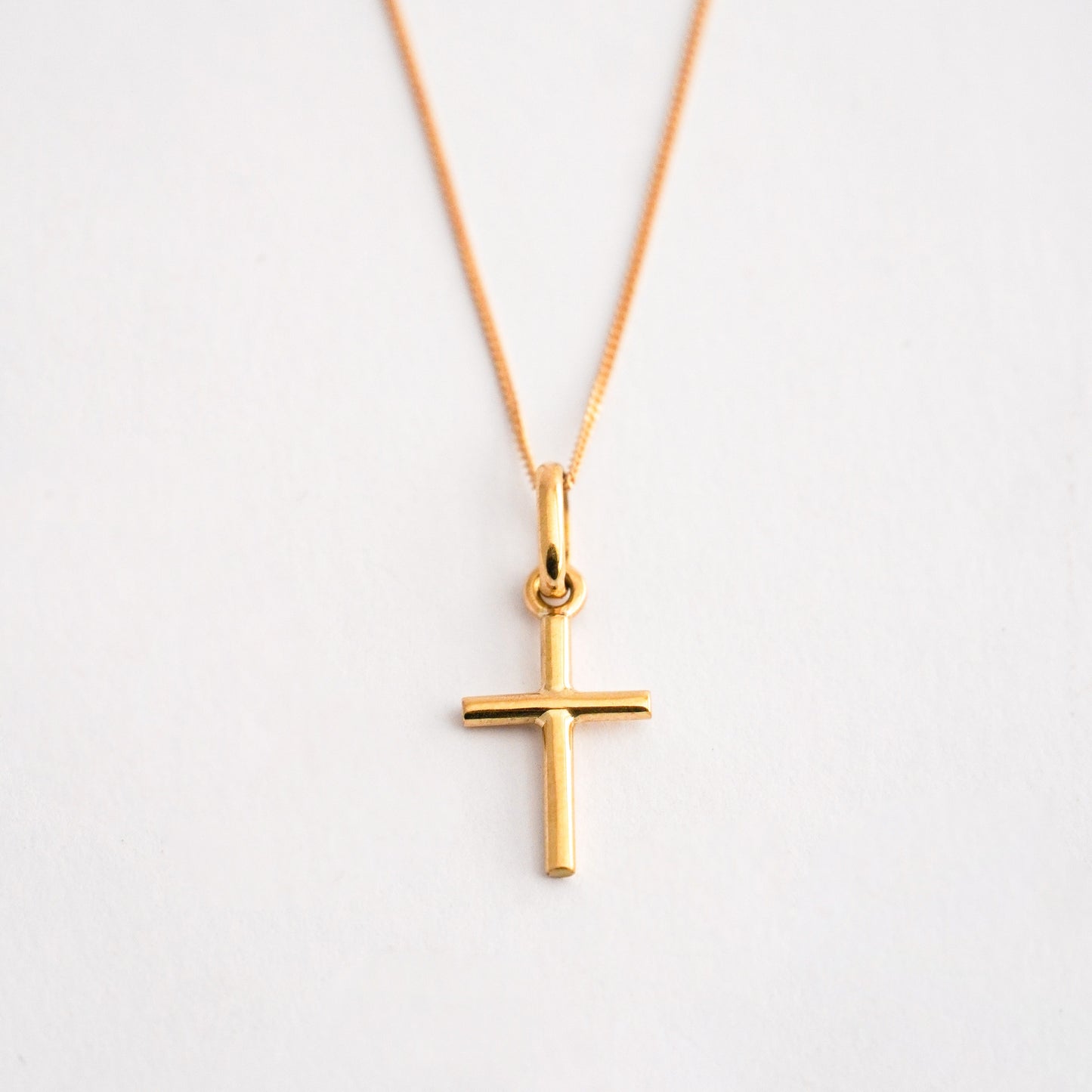 Pack cruz mini + Cadena en Oro18k 40 cm