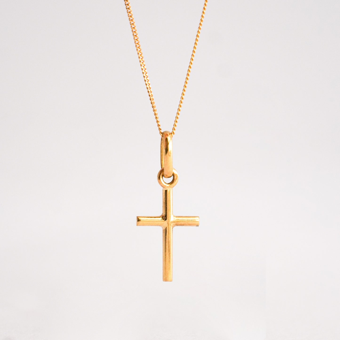 Pack cruz mini + Cadena en Oro18k 40 cm