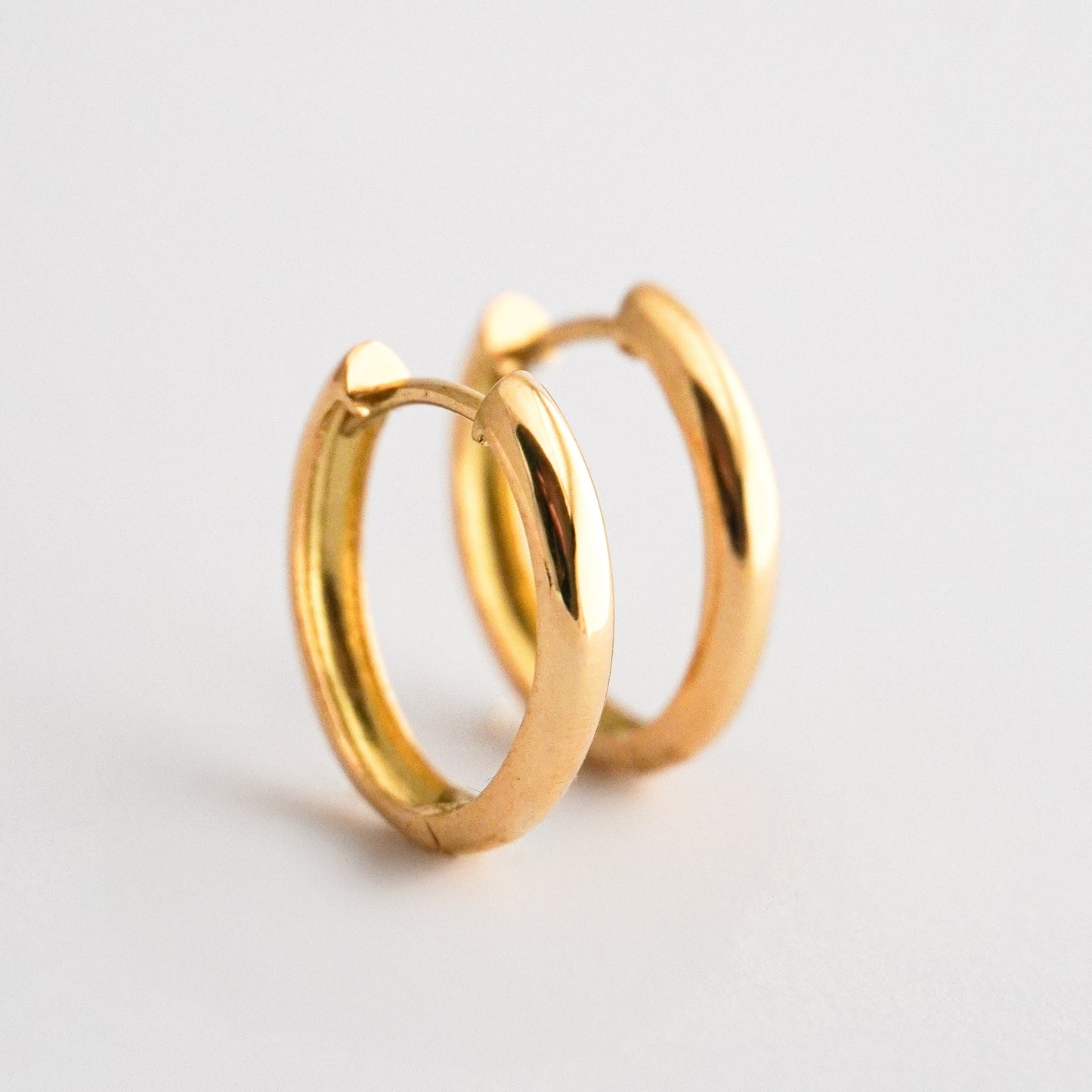 Argollas oval media caña oro 18k