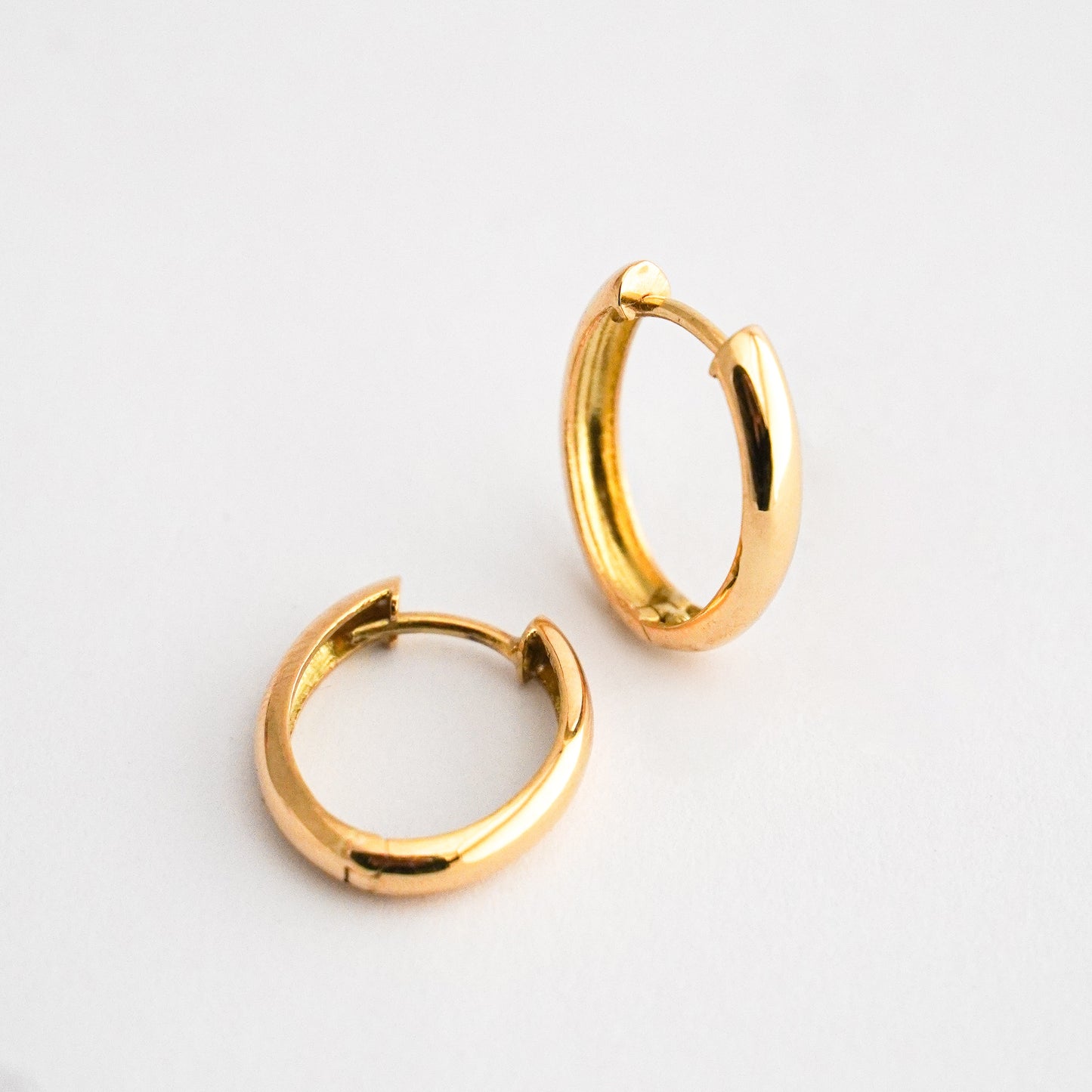 Argollas oval media caña oro 18k