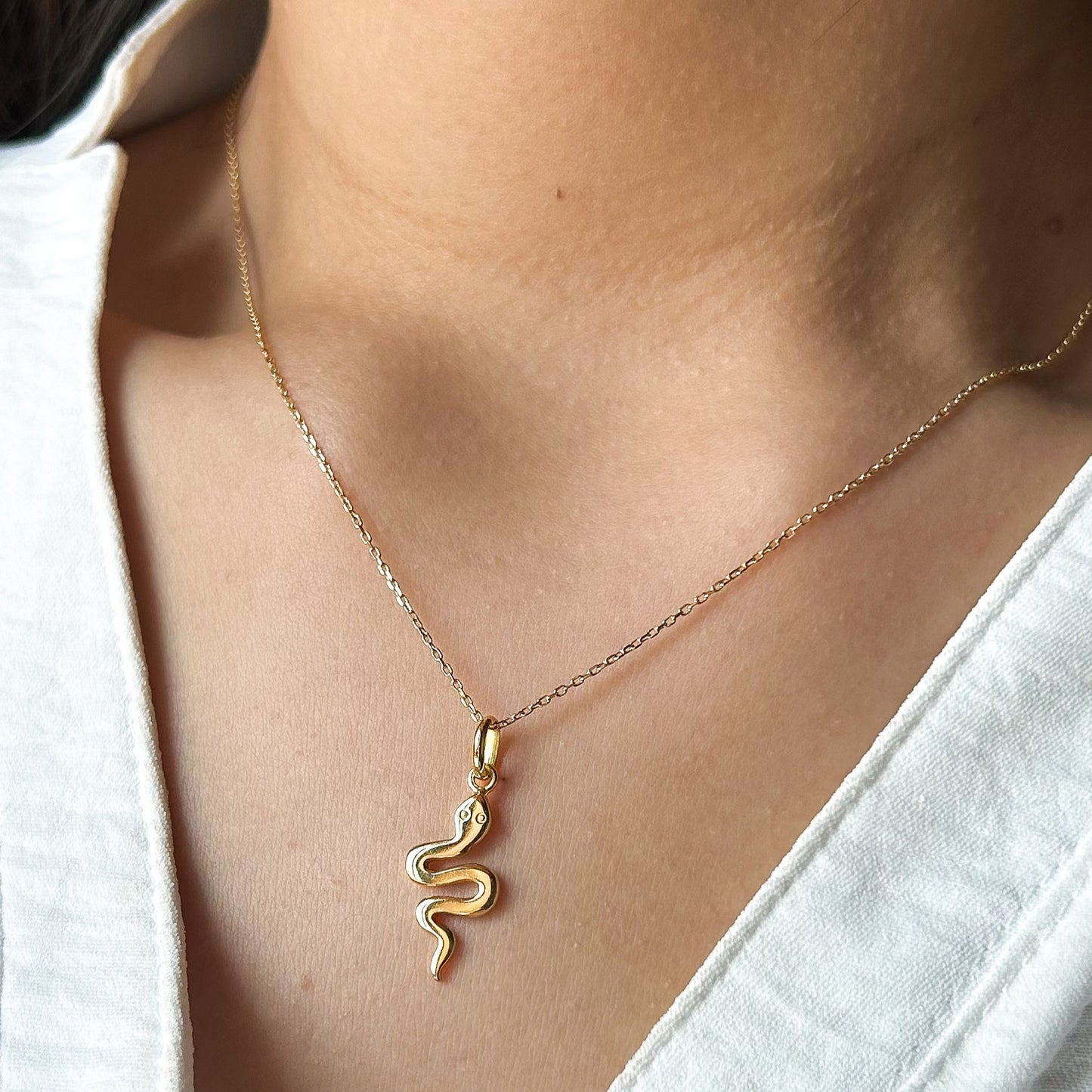 Dije de serpiente en Oro18k