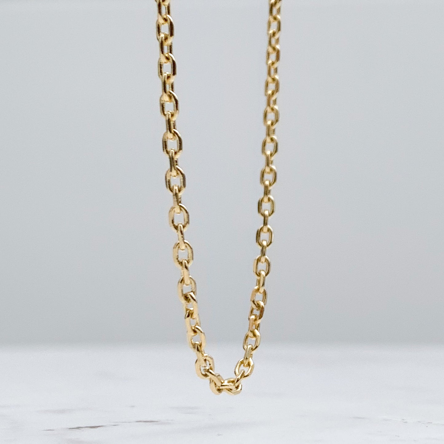 Cadena Prisma delgada Oro18k - Hombre