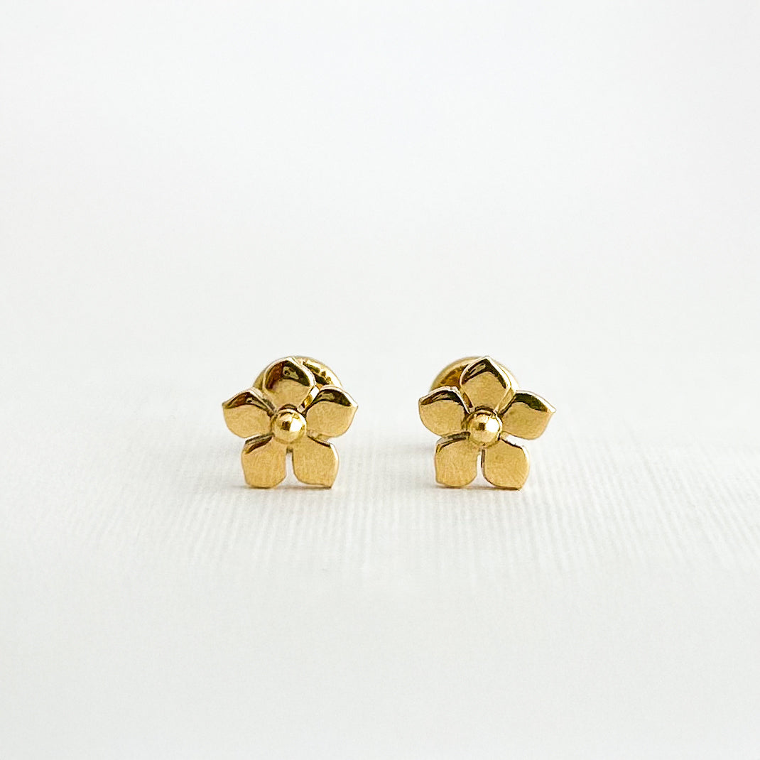 Aretes flor violeta oro 18k