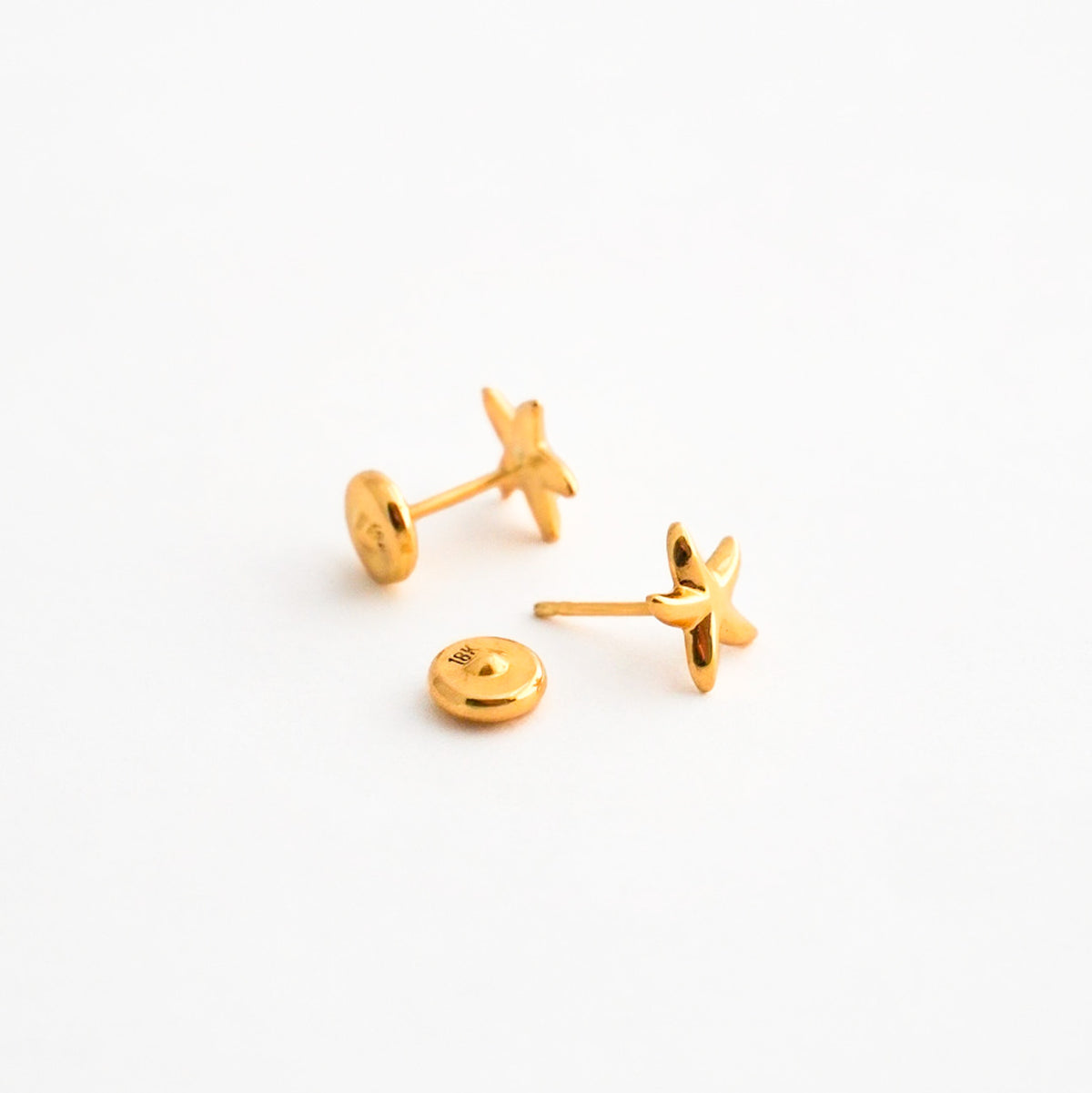 Arete Bebé de Estrella de Mar en Oro 18K