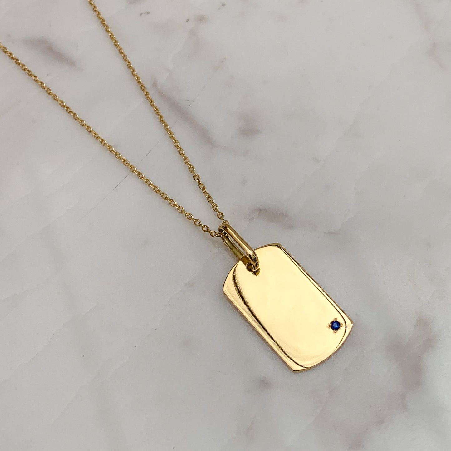Dije placa militar con zafiro en Oro18k
