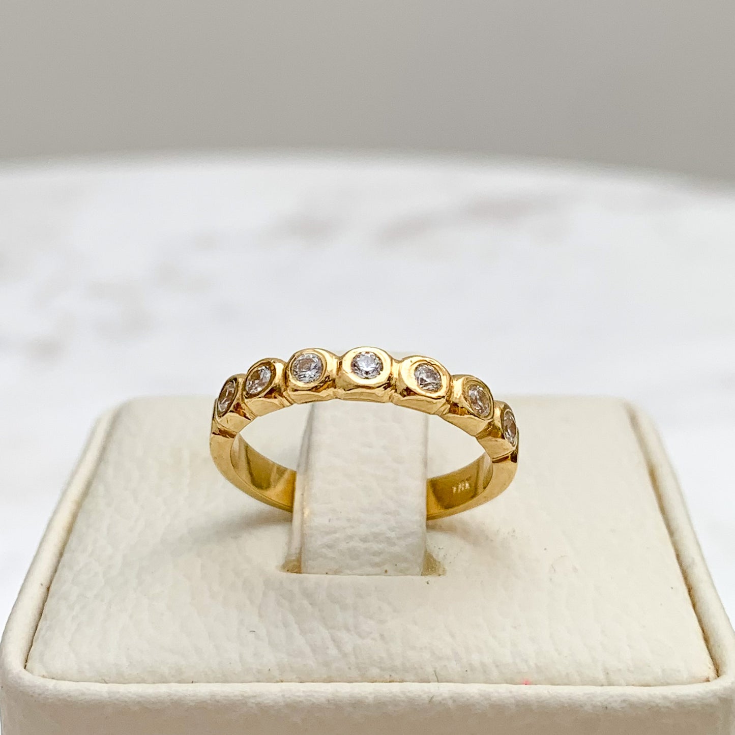 Anillo Medio Riviere redondo en Oro18k